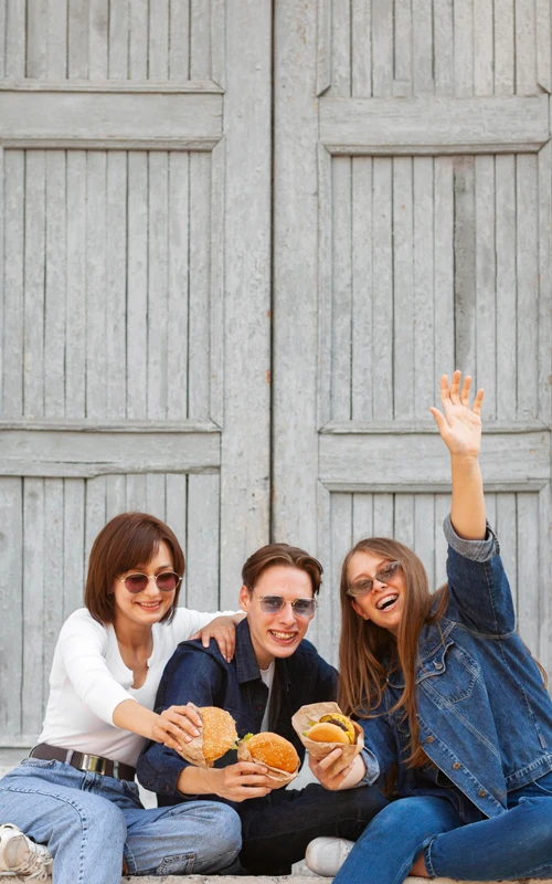 Friends eating burger