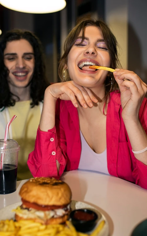 Close up person enjoying food